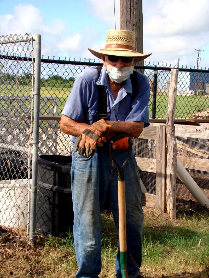 Ed Gregurek Longtime Master Gardener wears protective gear to work at VEG